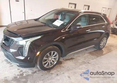 2021 Cadillac Xt4 Fwd Premium Luxury from USA, damaged, VIN 1GYFZCR42MF001347